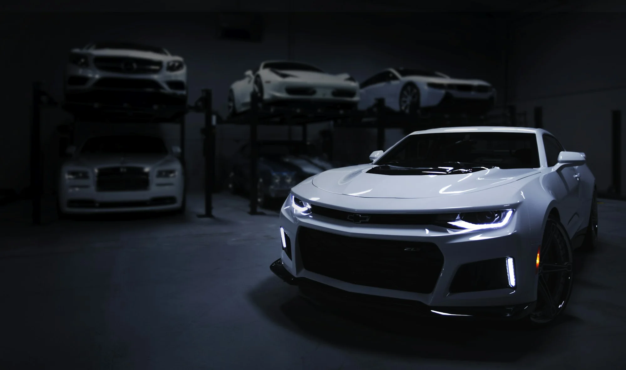White performance car inside a garage